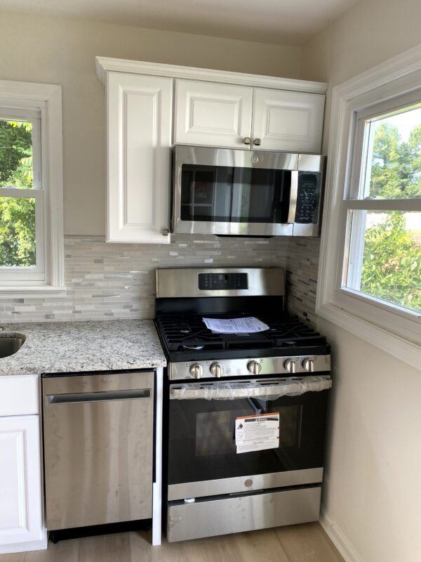 base cabinet pull out drawer showing pot and pan storage organization